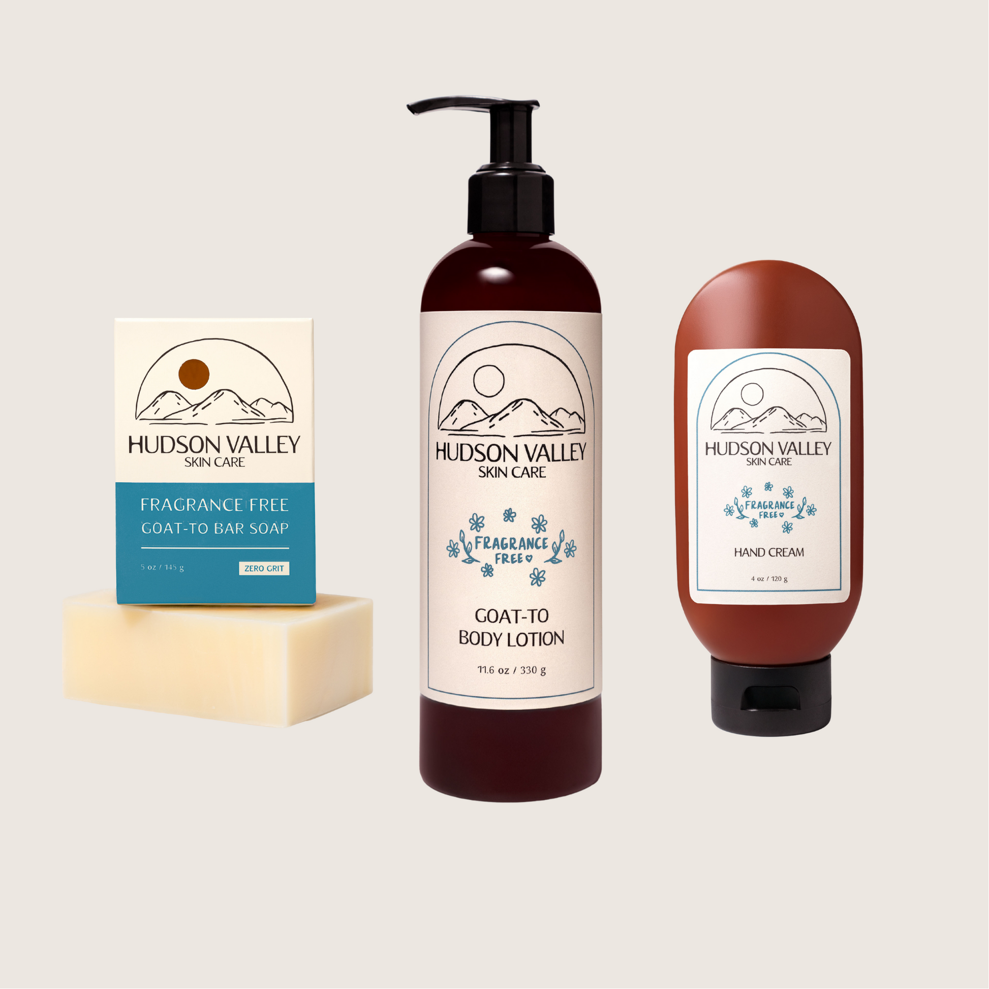 Hudson Valley skincare fragrance free products including soap, lotion, and hand cream on a light gray background